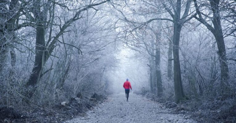 Someone running on a winters day